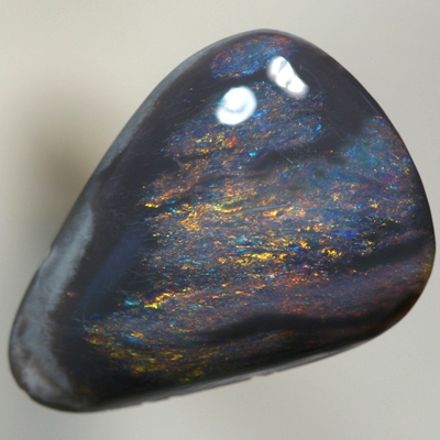 SOLID BLACK OPAL Red and copper fire moves between black opal